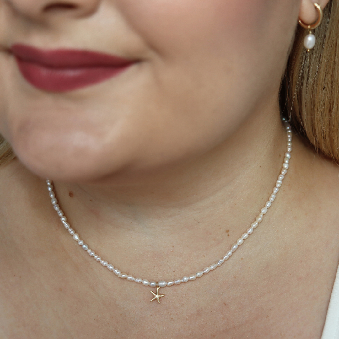 Star Whisper - Tiny Seed Pearls with a Gold Starfish Charm