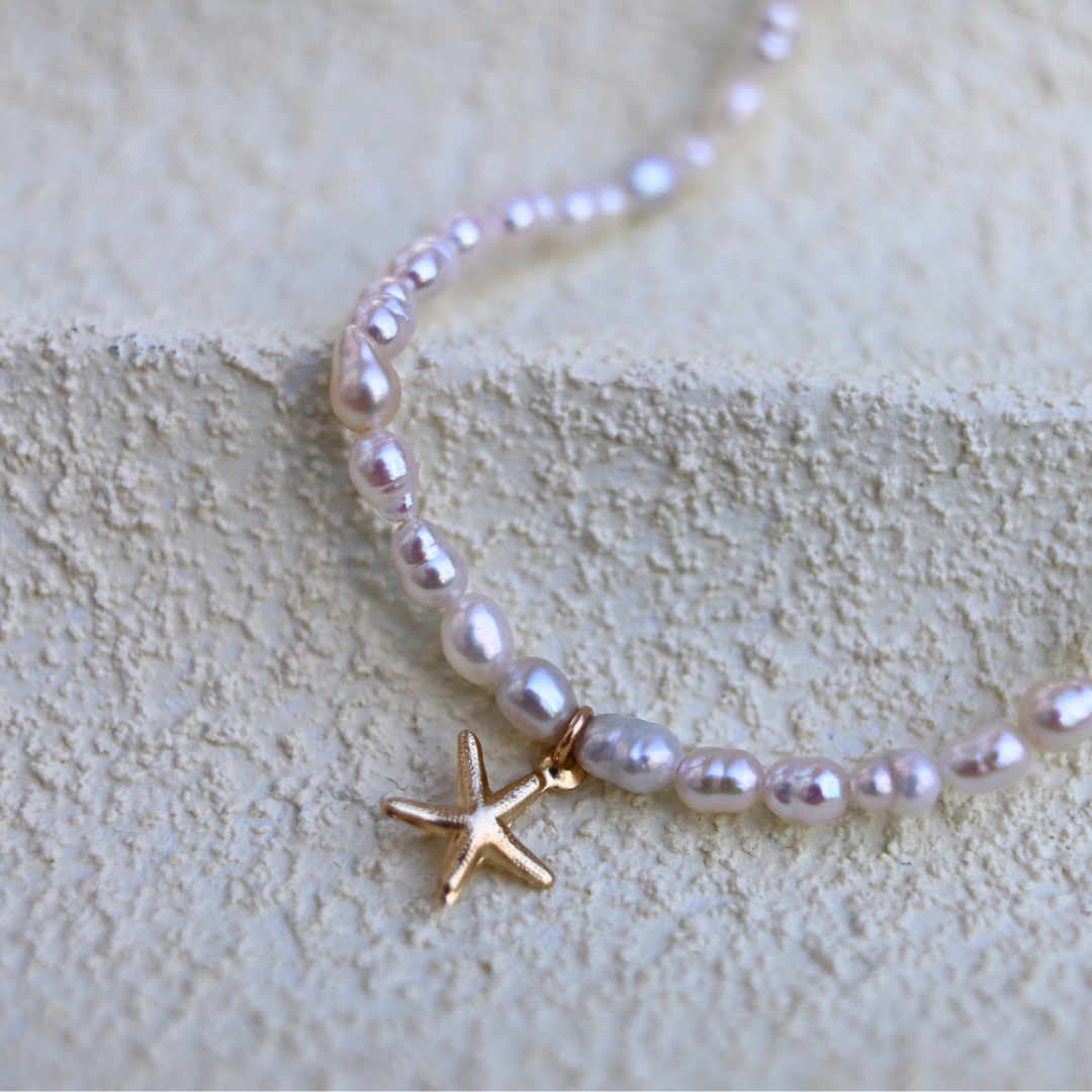 Star Whisper - Tiny Seed Pearls with a Gold Starfish Charm