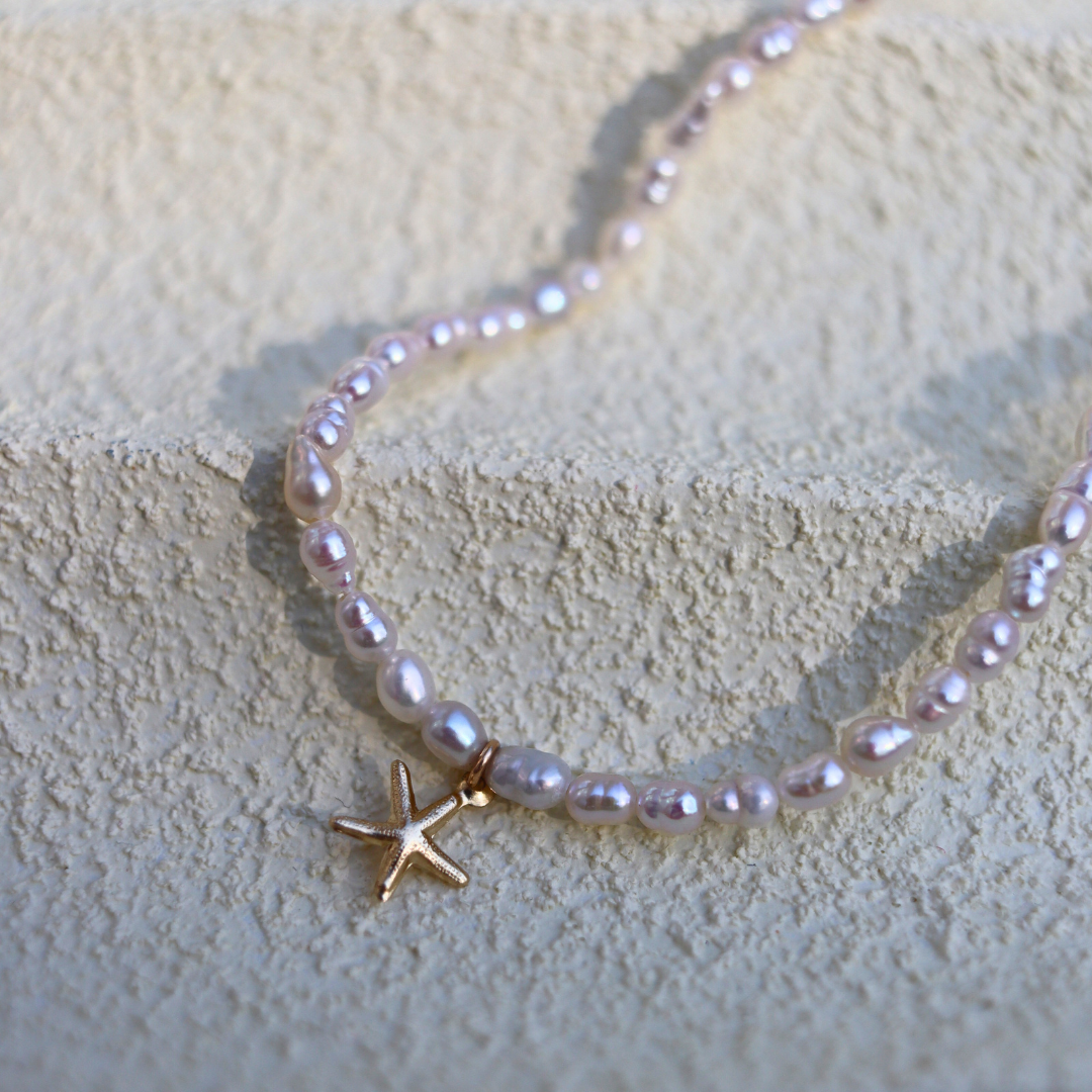 Star Whisper - Tiny Seed Pearls with a Gold Starfish Charm