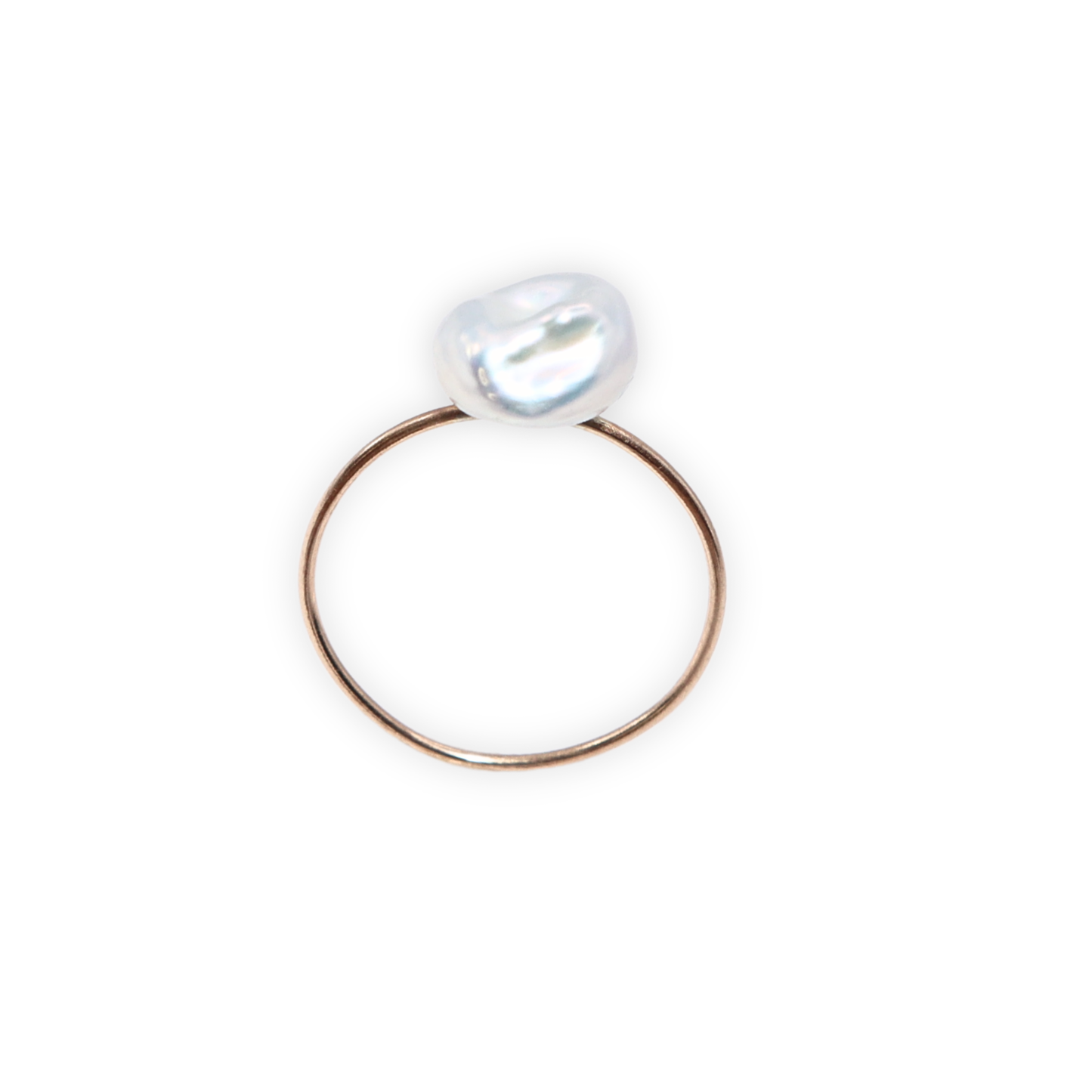 A beautiful baroque pearl gracefully perched on a gleaming gold ring, symbolizing elegance and refined taste.
