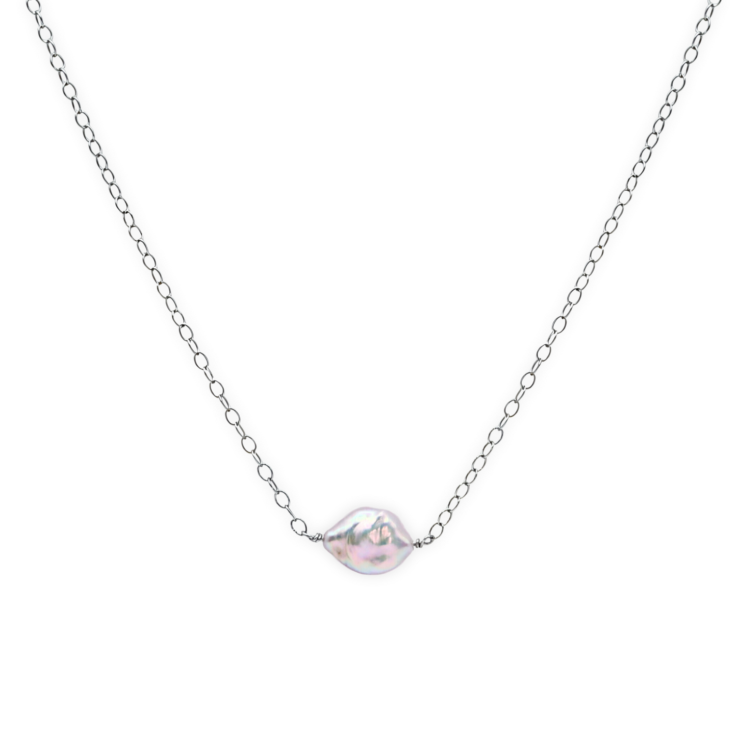 A delicate pearl necklace featuring a baroque pearl elegantly suspended on a silver chain, showcasing timeless beauty.