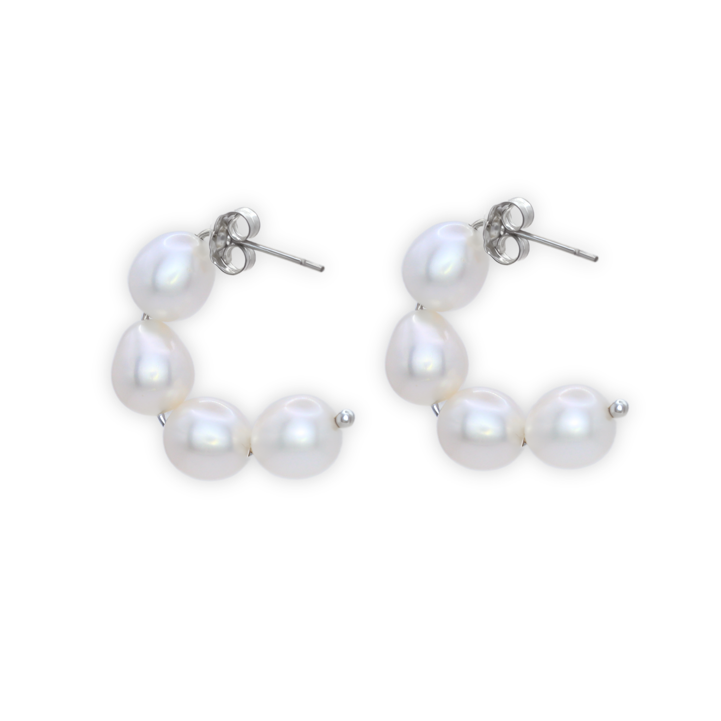 The delicate stud half hoop design is complemented by large rice pearls, creating a sophisticated and exclusive look.