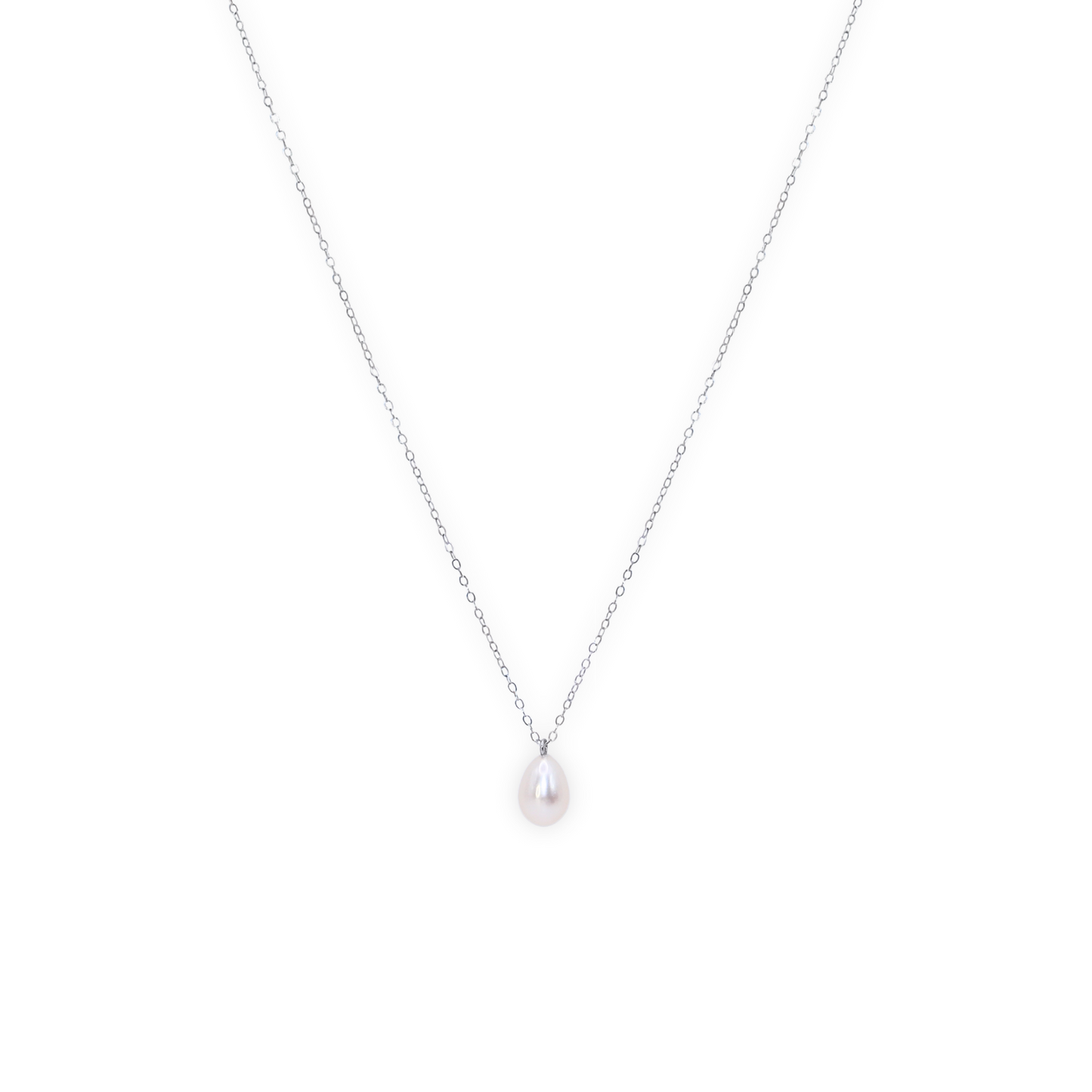A stunning white teardrop pearl necklace complemented by a gleaming silver chain, embodying elegance and classic style.