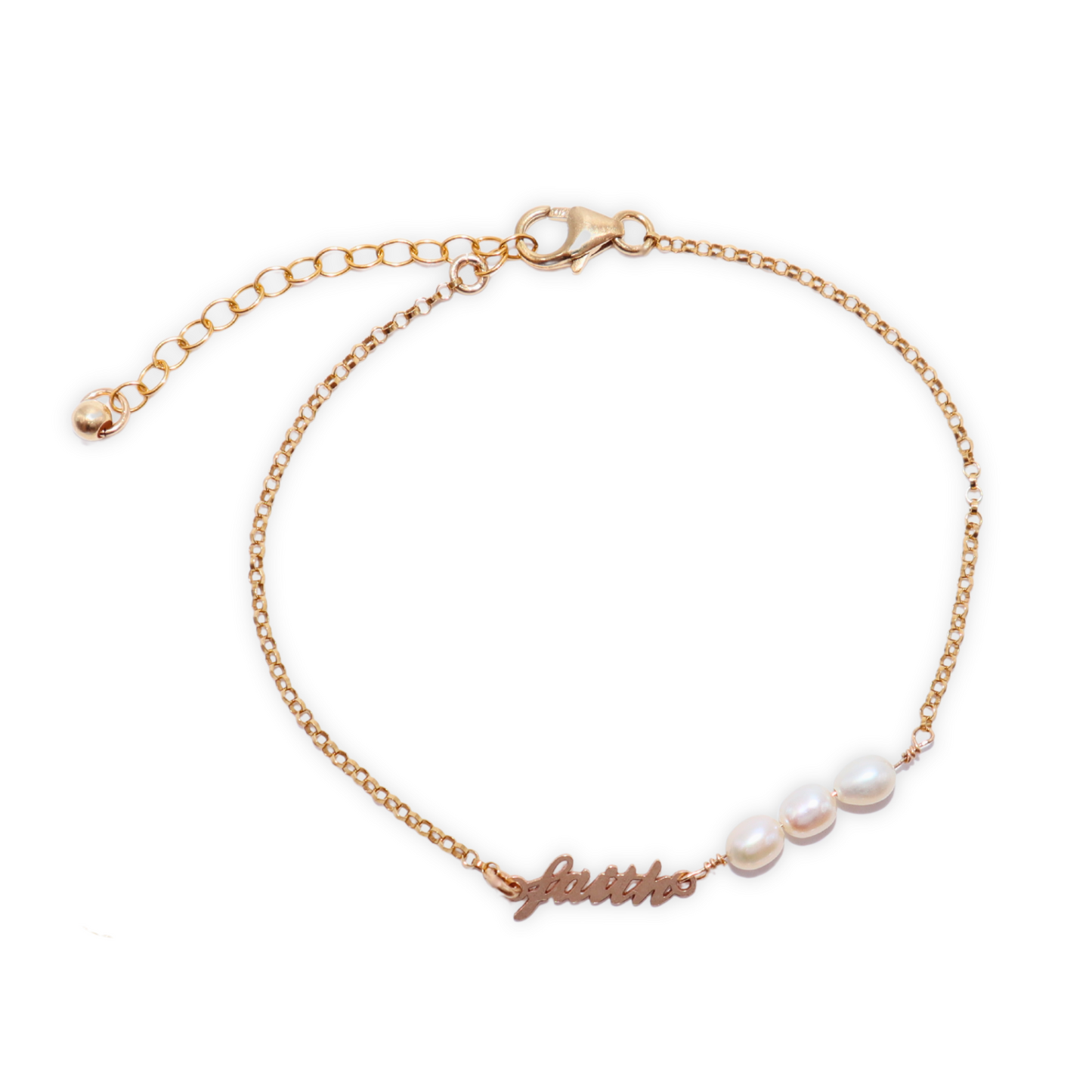 a dainty chain adorned with three small rice pearls and the word "faith"