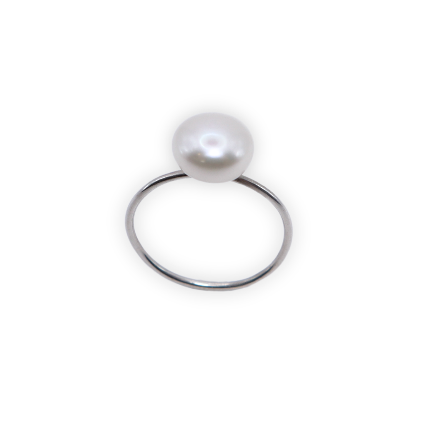 A luxurious silver ring adorned with a large exquisite pearl, radiating elegance and timeless beauty.
