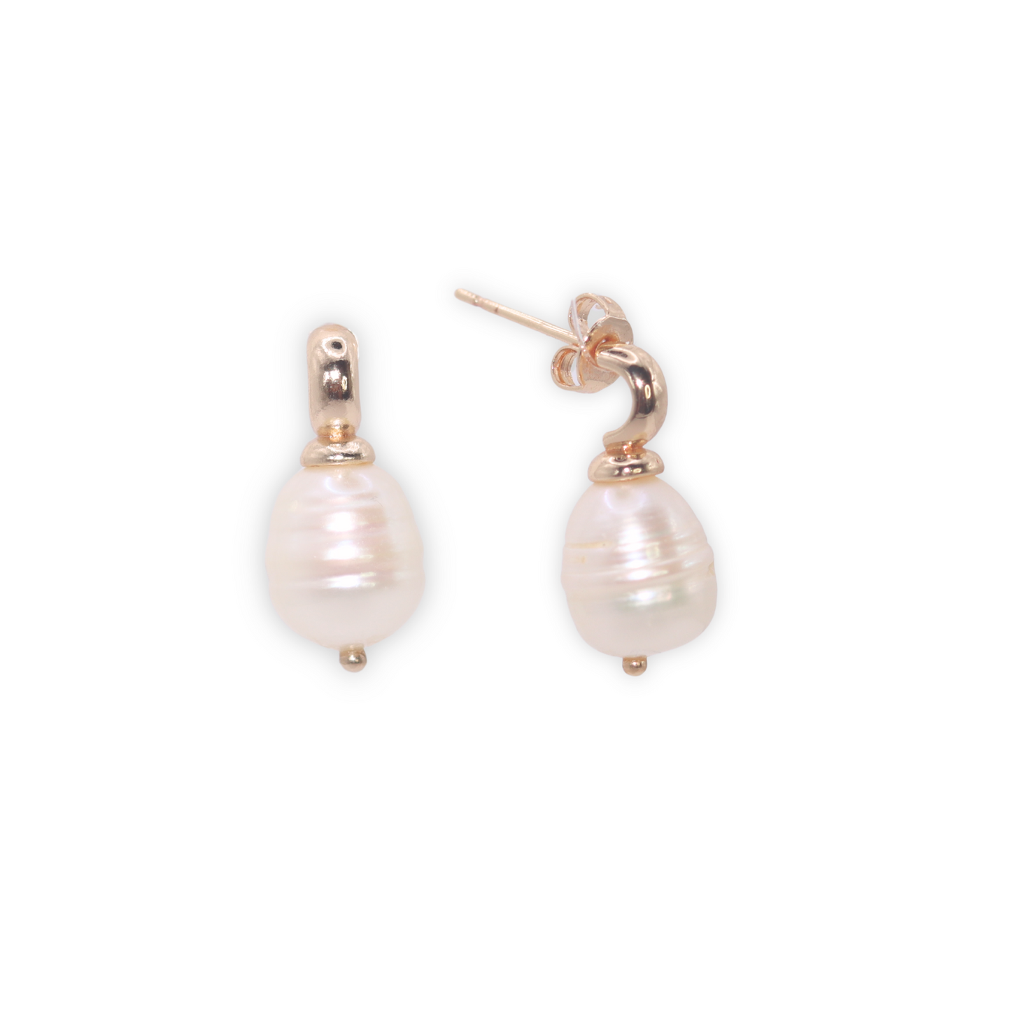 Each stud features a unique, irregularly-shaped rice pearl, adding a touch of sophistication and luxury to your look.