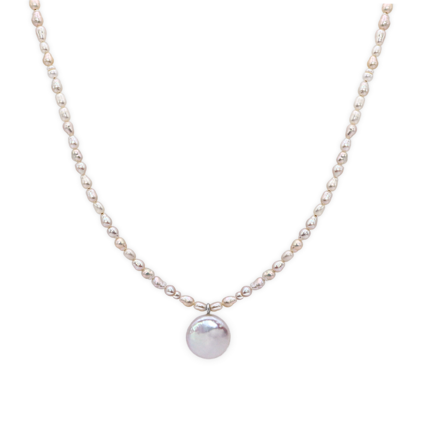 A refined white pearl necklace adorned with a coin pearl pendant, showcasing simplicity and elegance.