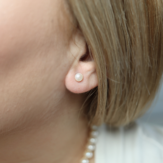 5mm pearl studs that add a touch of sophistication to any outfit