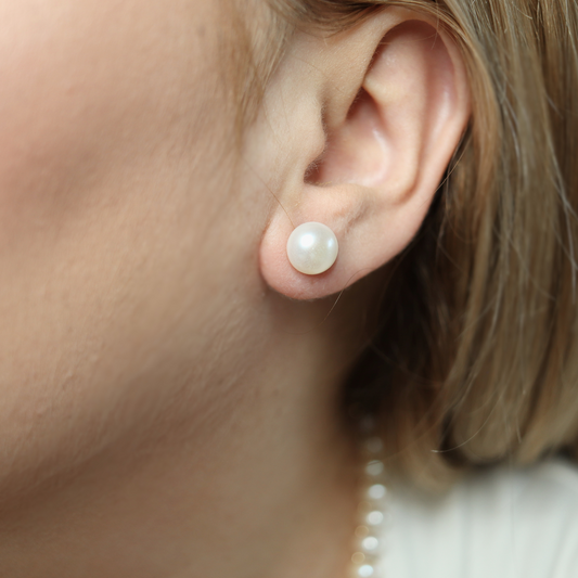 9mm pearl studs that add a touch of sophistication to any outfit