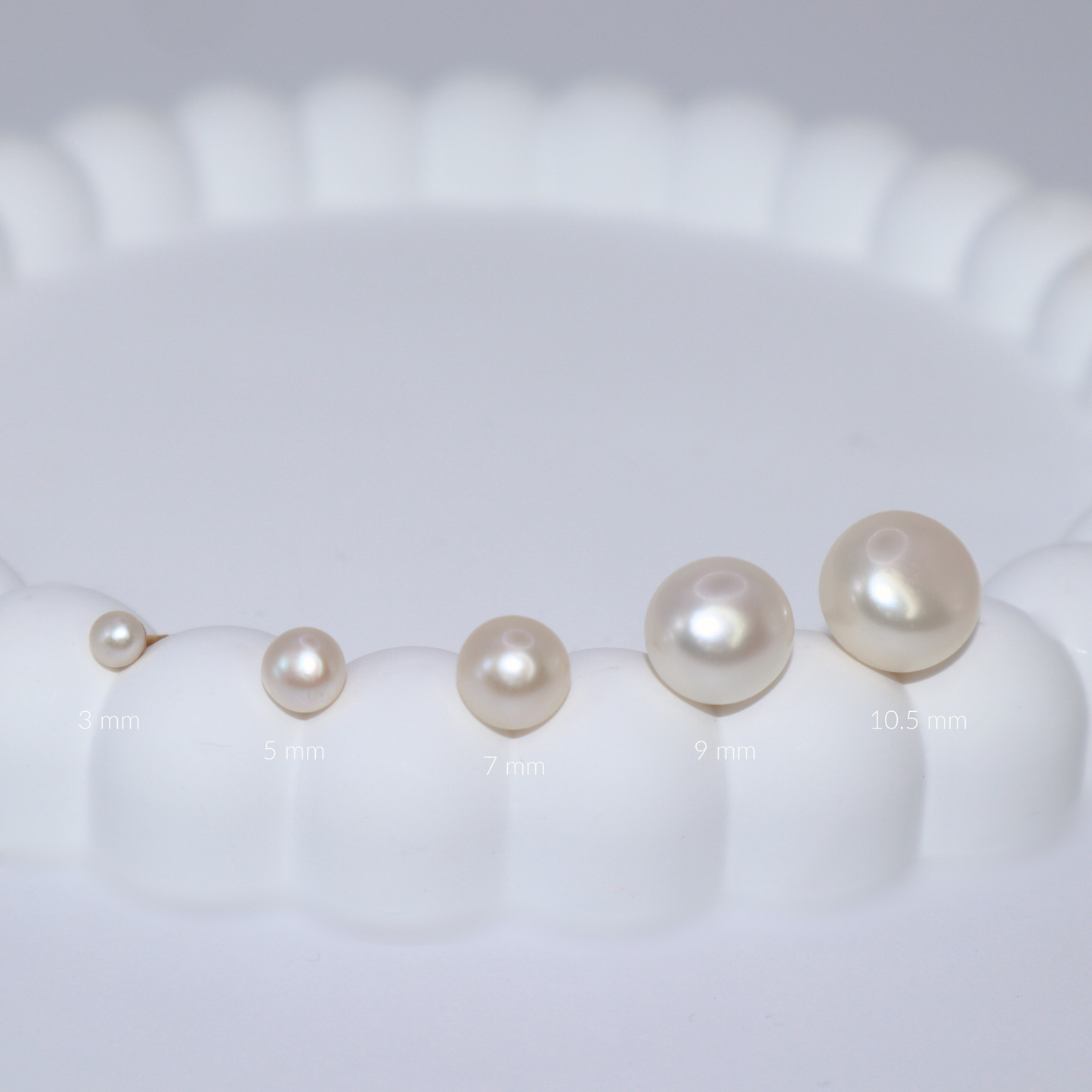 3mm pearl studs that add a touch of sophistication to any outfit