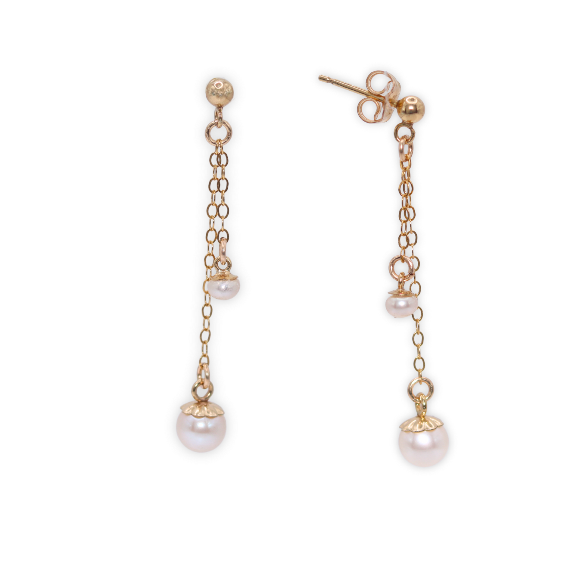 Made with two small pearls delicately dangling on dainty chains, these ball stud earrings add a touch of sophistication to any outfit.