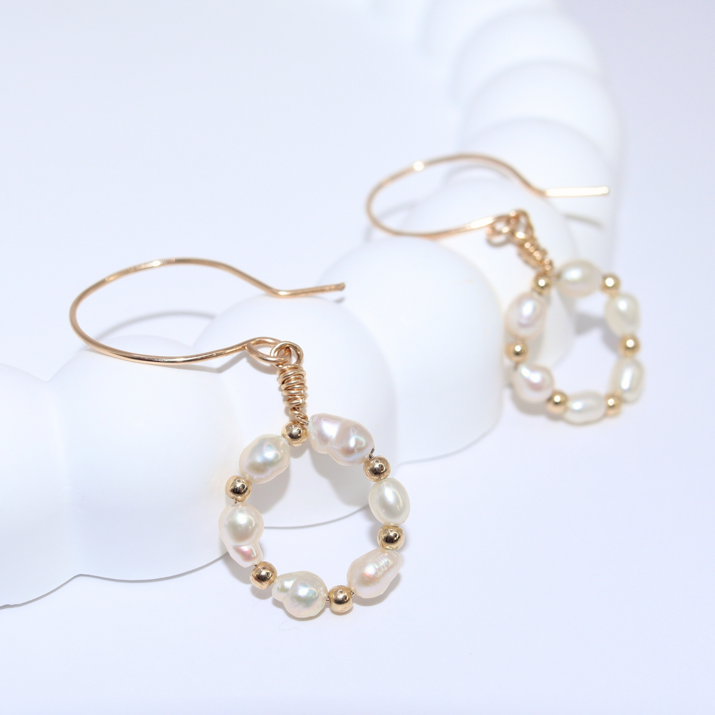 With its alternating seed and beads design, these earrings exude elegance. The hook style makes them easy to wear, while the matching ring, bracelet, and necklace complete the exquisite look.