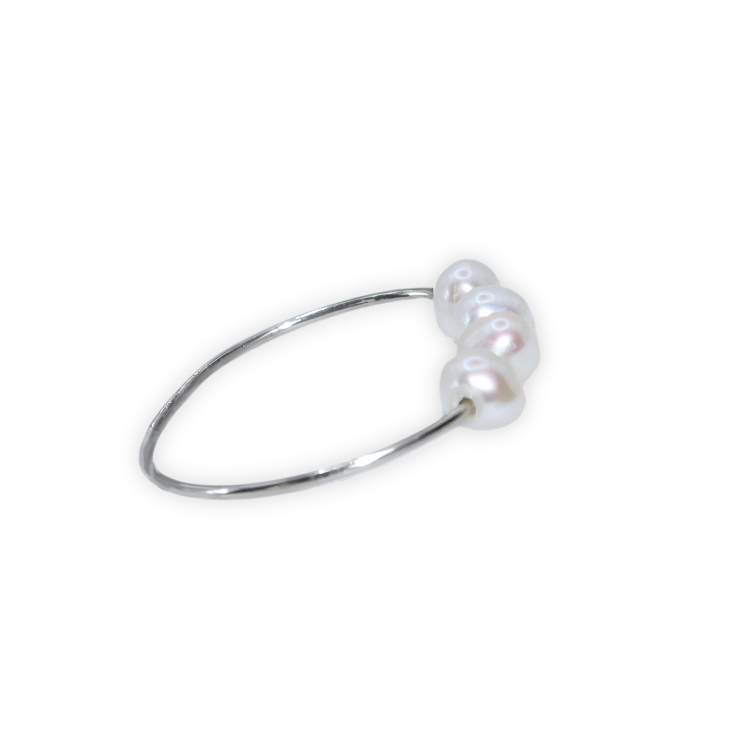 A stunning white pearl ring featuring four exquisite pearls set on a luxurious silver band, radiating elegance and sophistication.