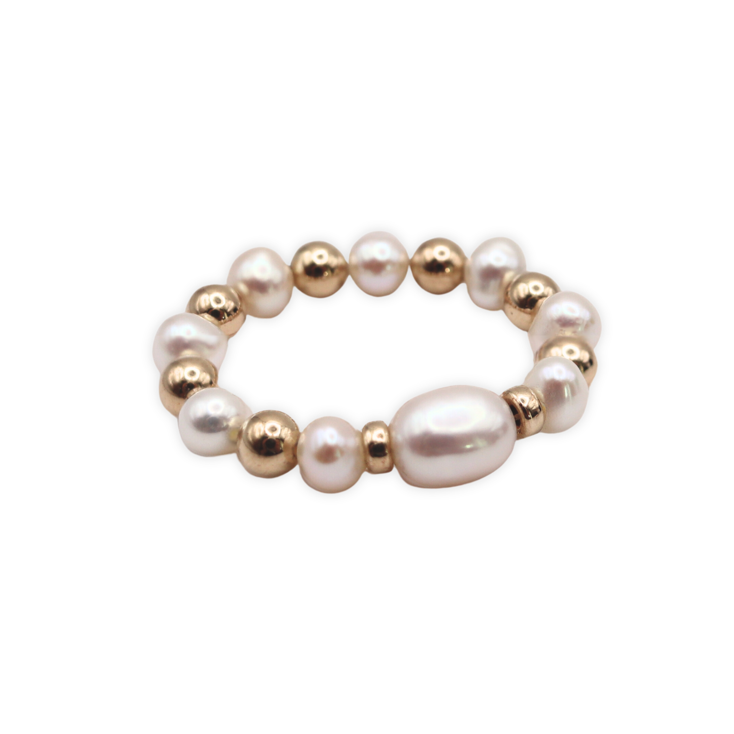 Exquisite gold beads and white pearl ring, a timeless accessory that embodies elegance and refined style.