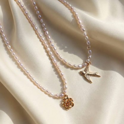 Skyflight - Baroque Pearls with a Graceful Flying Bird Charm
