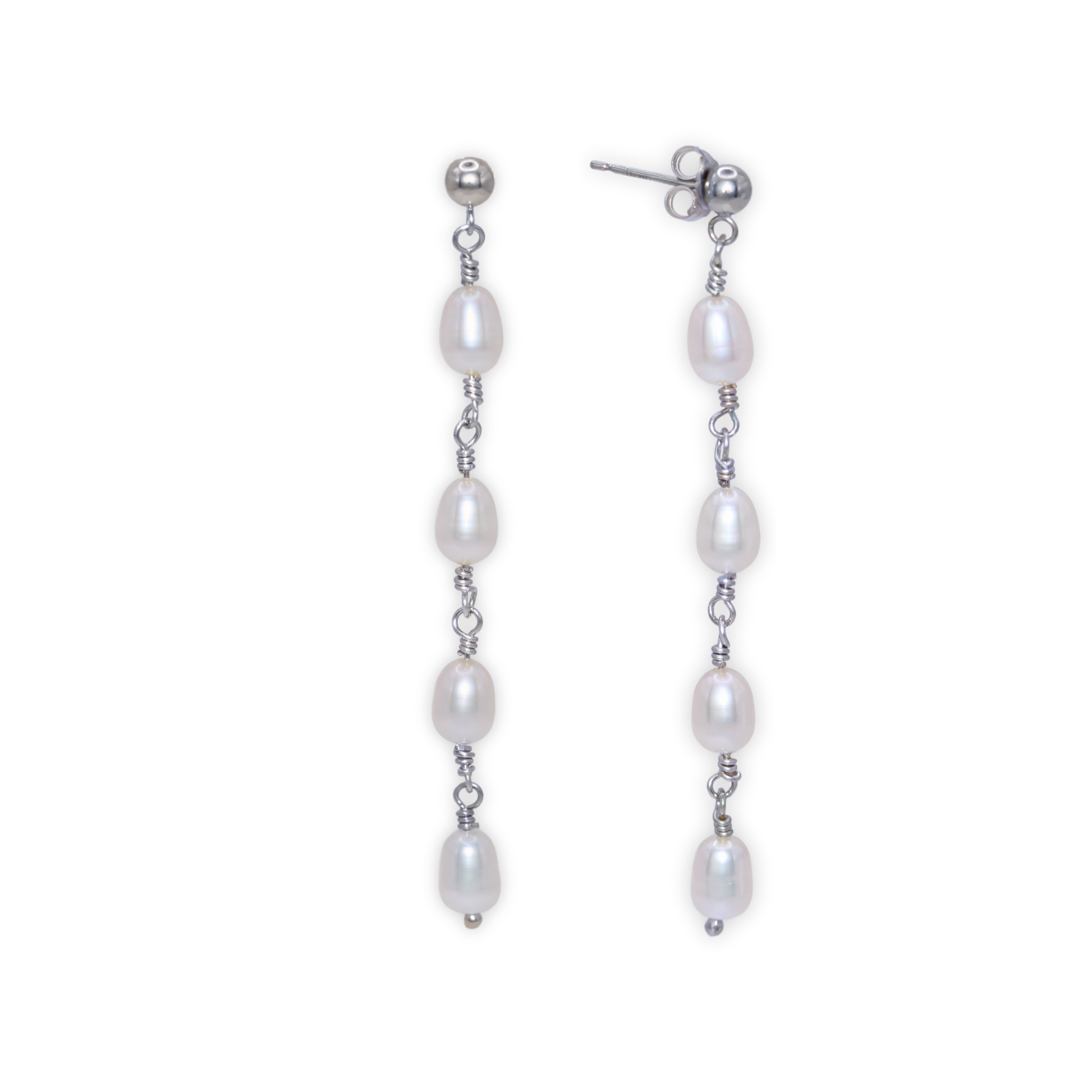 Elegant silver and four ivory pearl drop earrings, exuding sophistication and timeless beauty, perfect for any luxurious occasion.