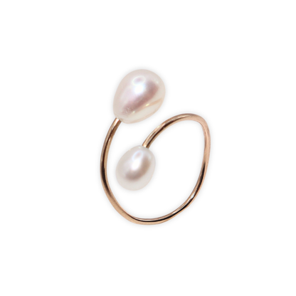 A stunning wrap pearl ring featuring two exquisite teardrop pearls, elegantly set to capture timeless beauty and sophistication.