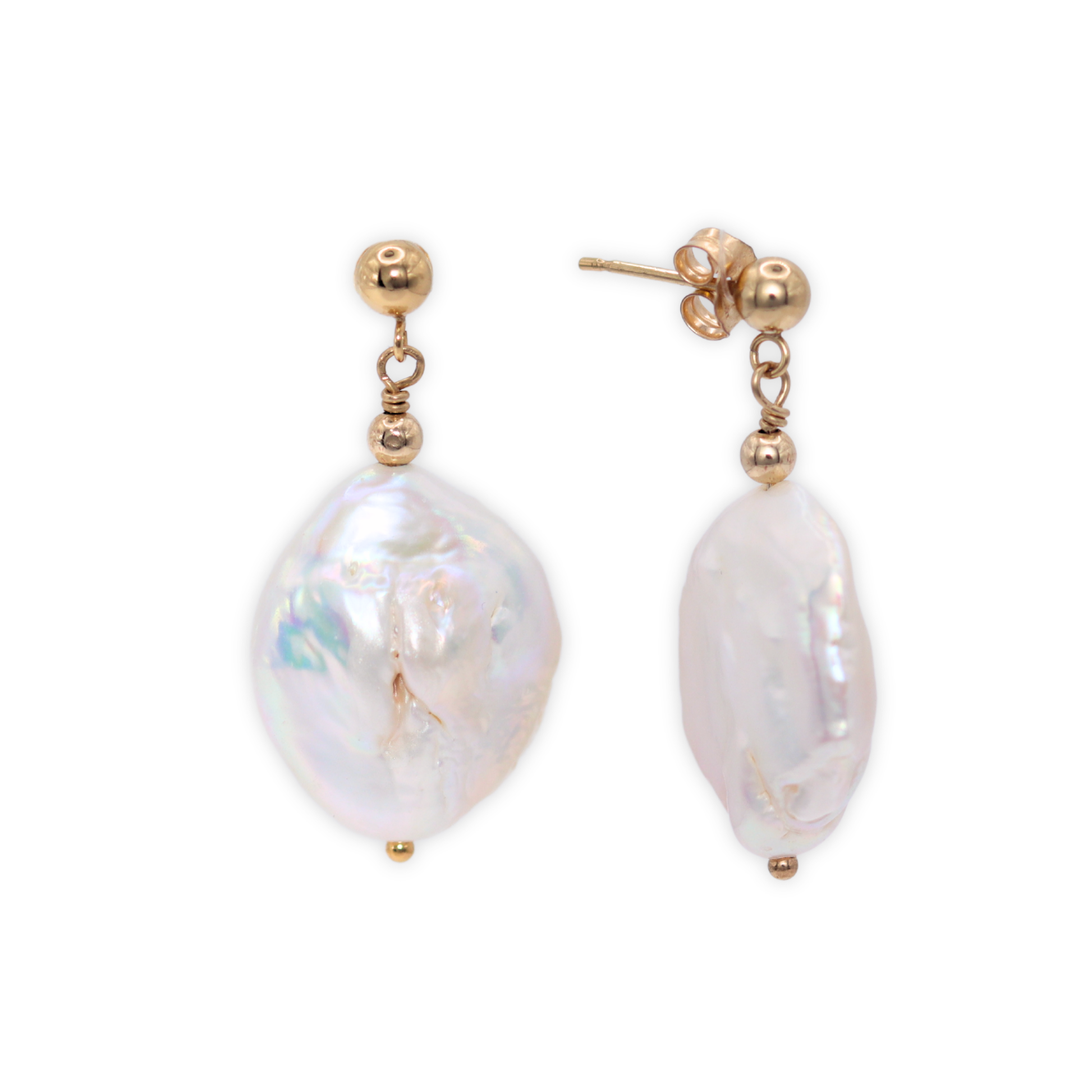 These exquisite earrings feature large baroque pearls delicately suspended from a classic ball stud. 