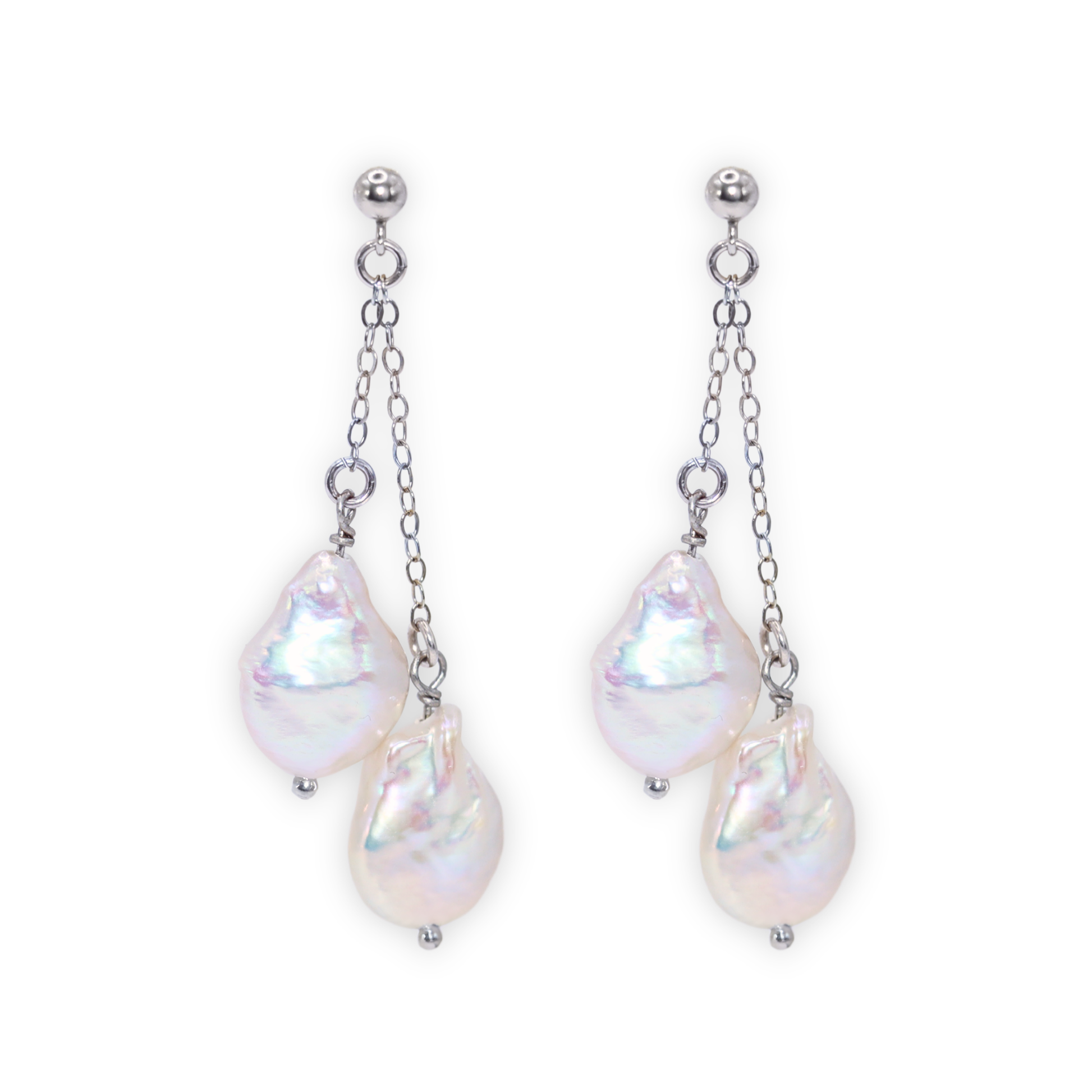 Featuring stunning baroque pearls dangling on dainty chains, these earrings exude elegance and luxury.