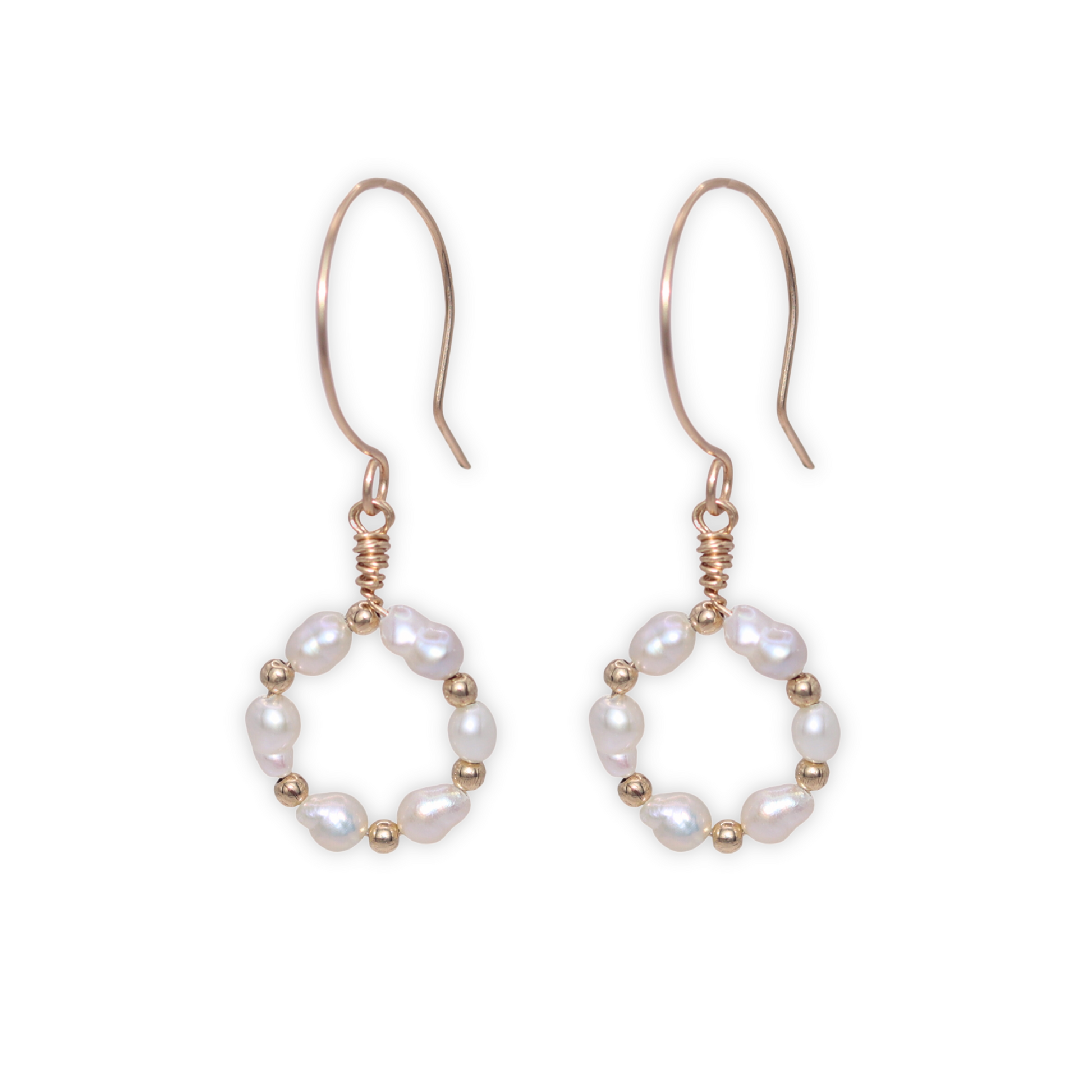  With its alternating seed and beads design, these earrings exude elegance. The hook style makes them easy to wear, while the matching ring, bracelet, and necklace complete the exquisite look. 
