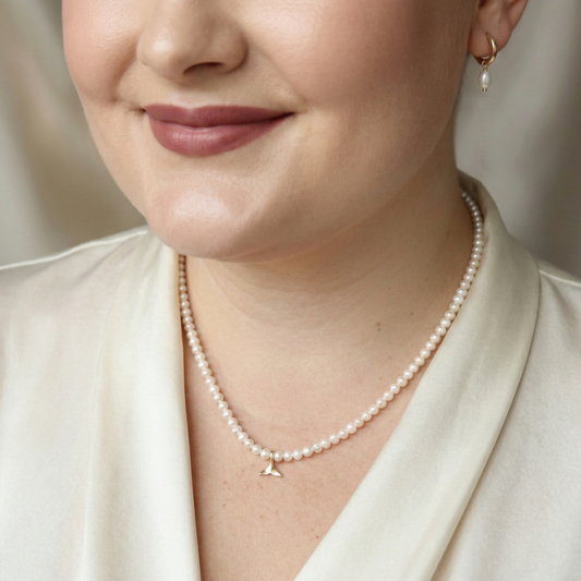 Ocean Drift - Potato Pearls & a Gold Dolphin Tail Charm Necklace