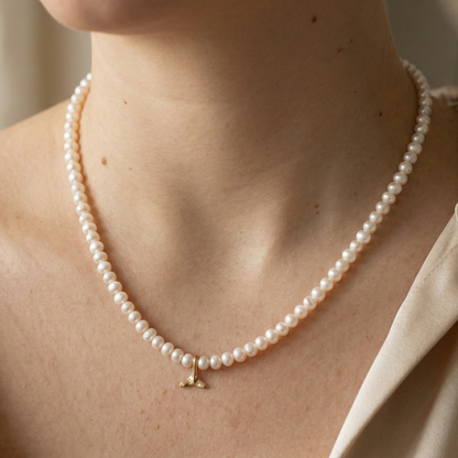 Ocean Drift - Potato Pearls & a Gold Dolphin Tail Charm Necklace