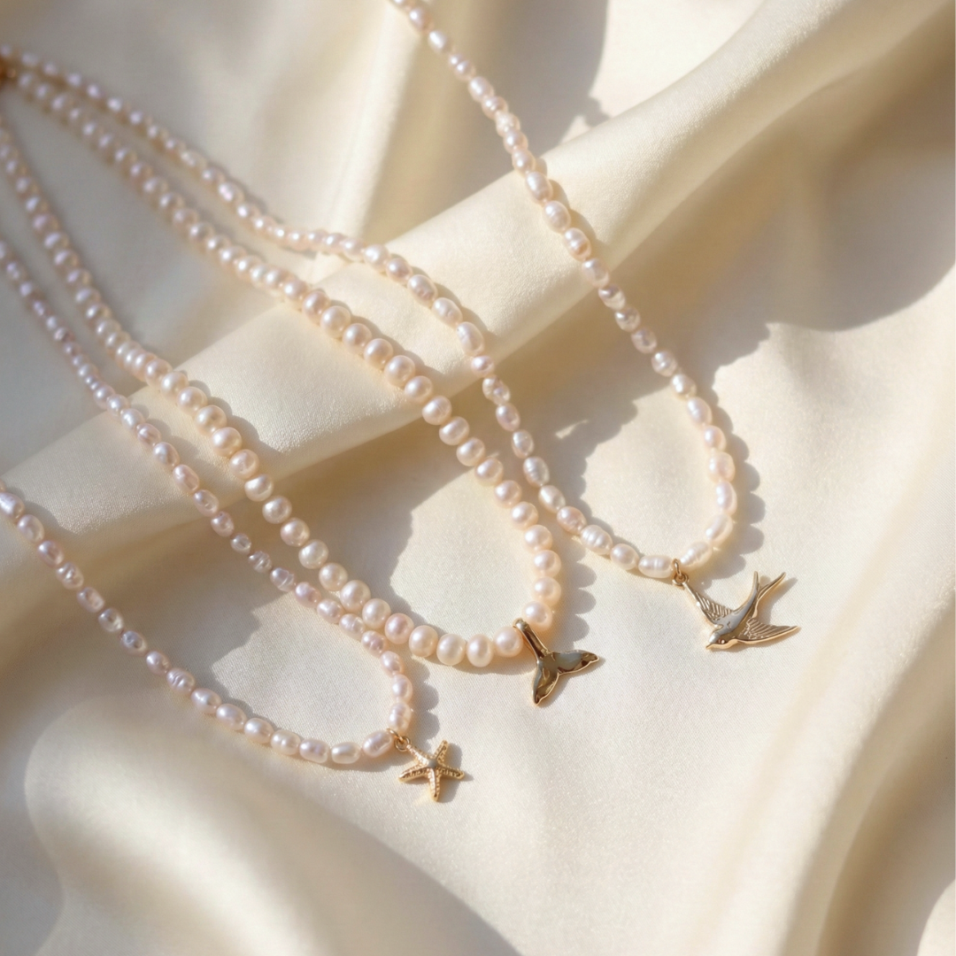 Star Whisper - Seed Pearls with a Gold Starfish Charm